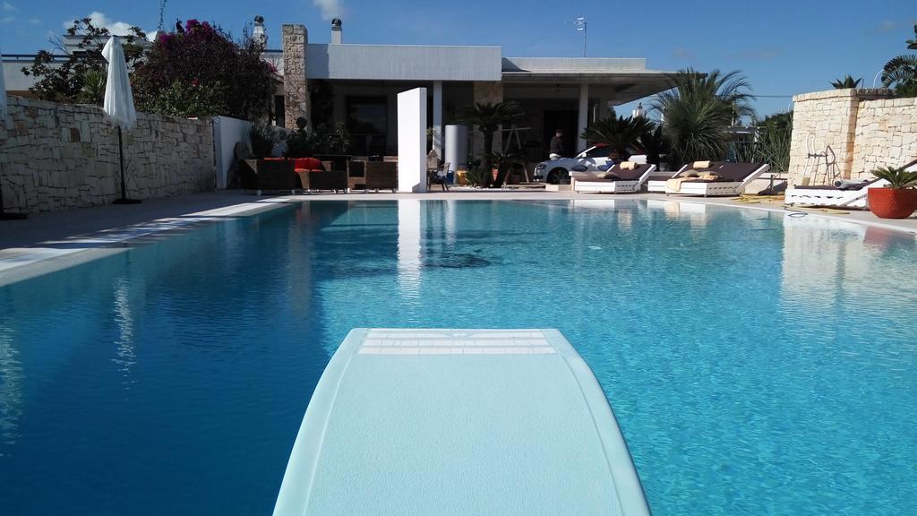 Carone Suite-Charme&Pool โปลีญาโนอามาเร ภายนอก รูปภาพ